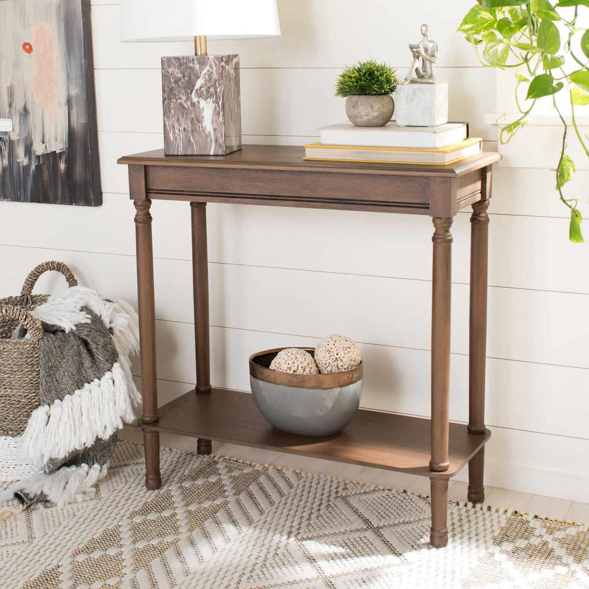 Warm brown wood sets off the display top and lower shelf for decorative accents.