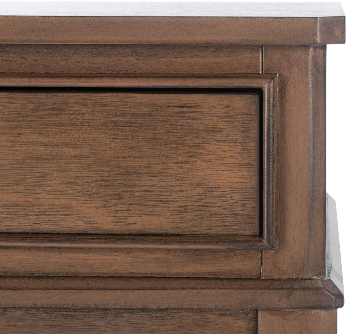 Warm brown wood grain and raised drawer trim add texture to this classic console