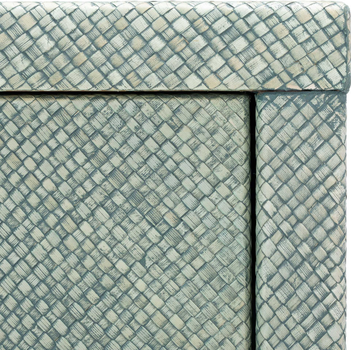Crosshatched turquoise texture covers the drawer front, top edge, and frame.