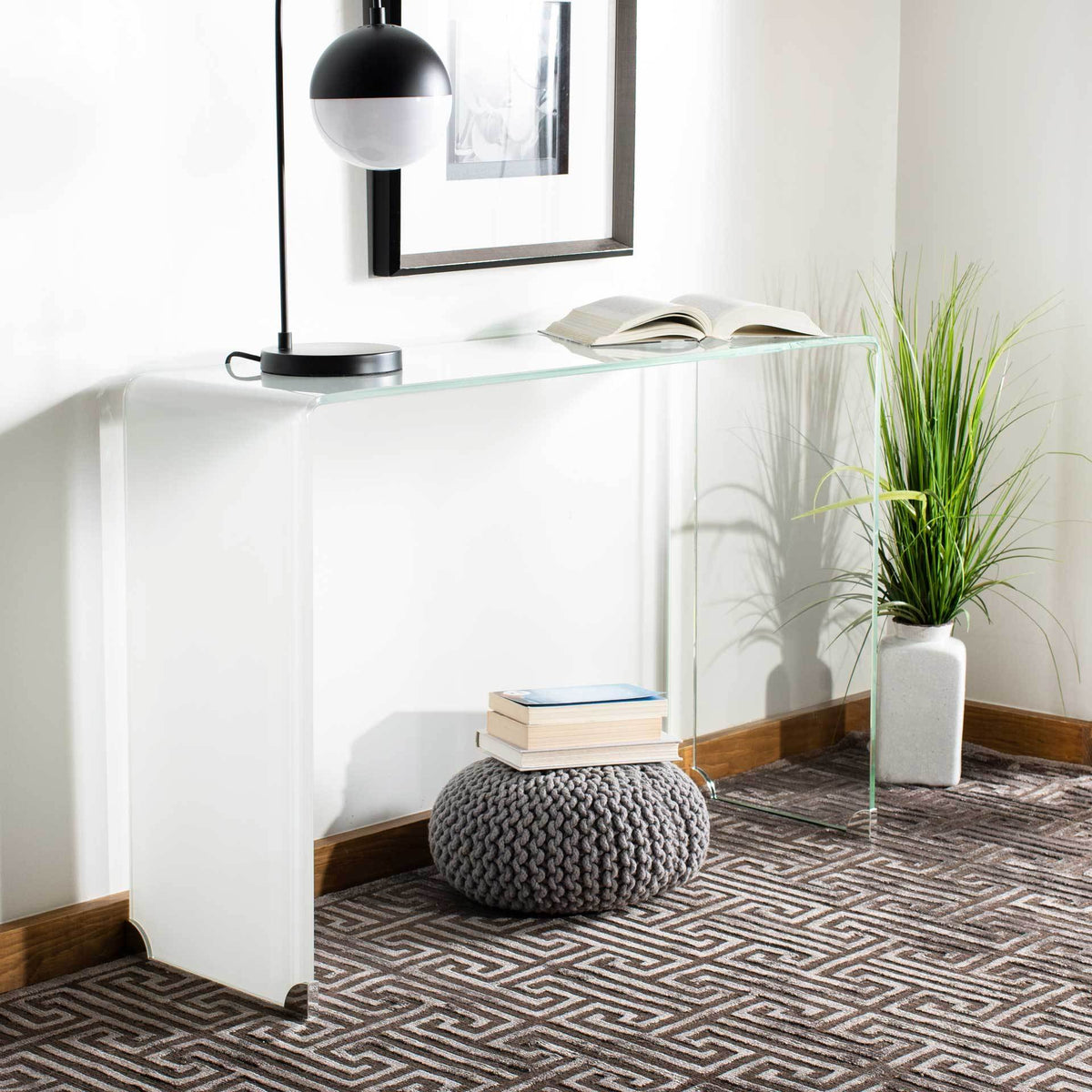 White ombre glass console brings a soft, airy accent to a modern room
