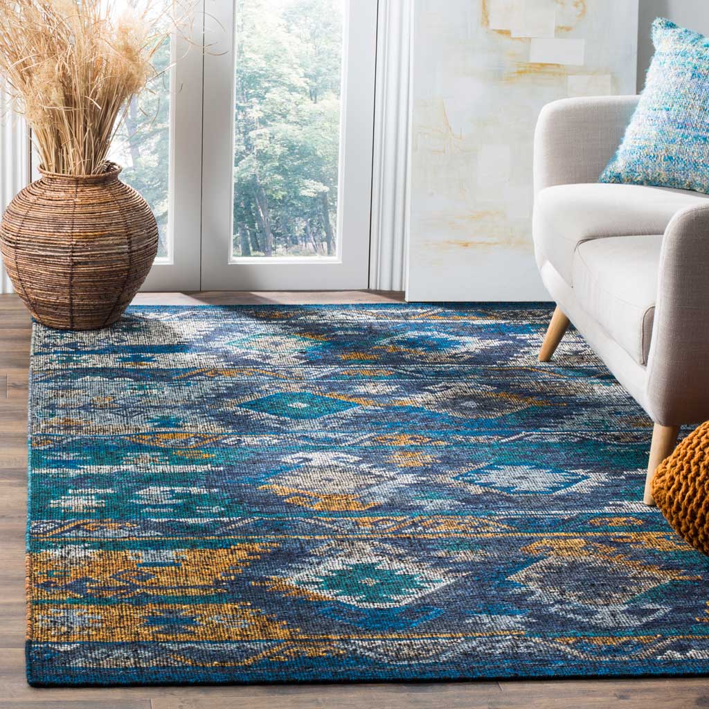 Teal, blue, and gold motifs bring vibrant warmth to a bright living room.