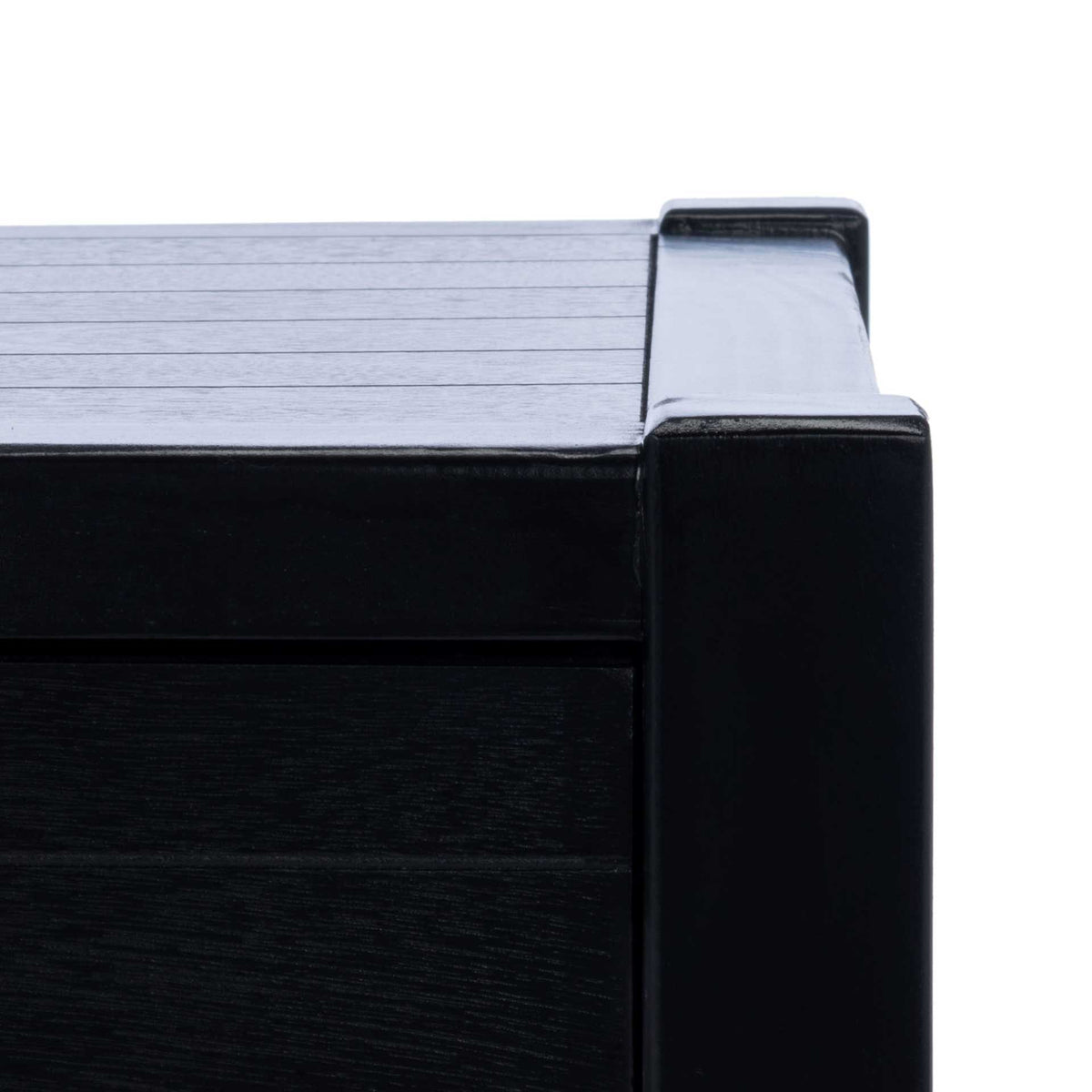 Subtle wood grain and a raised corner post give this black coffee table a sturdy, tailored look.