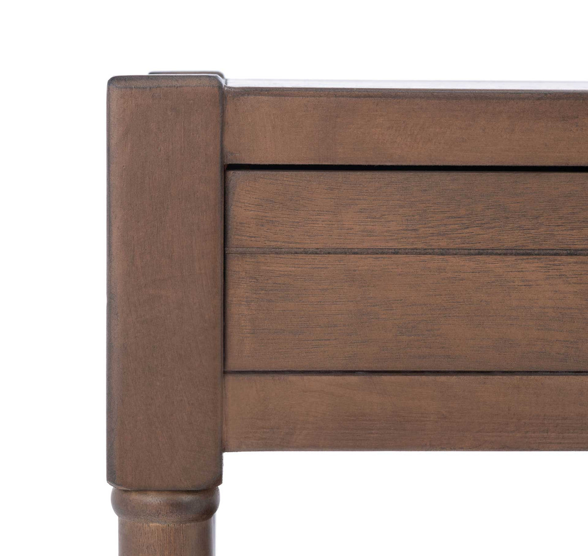 Visible brown wood grain brings warmth to the coffee table's squared corner and paneled frame.