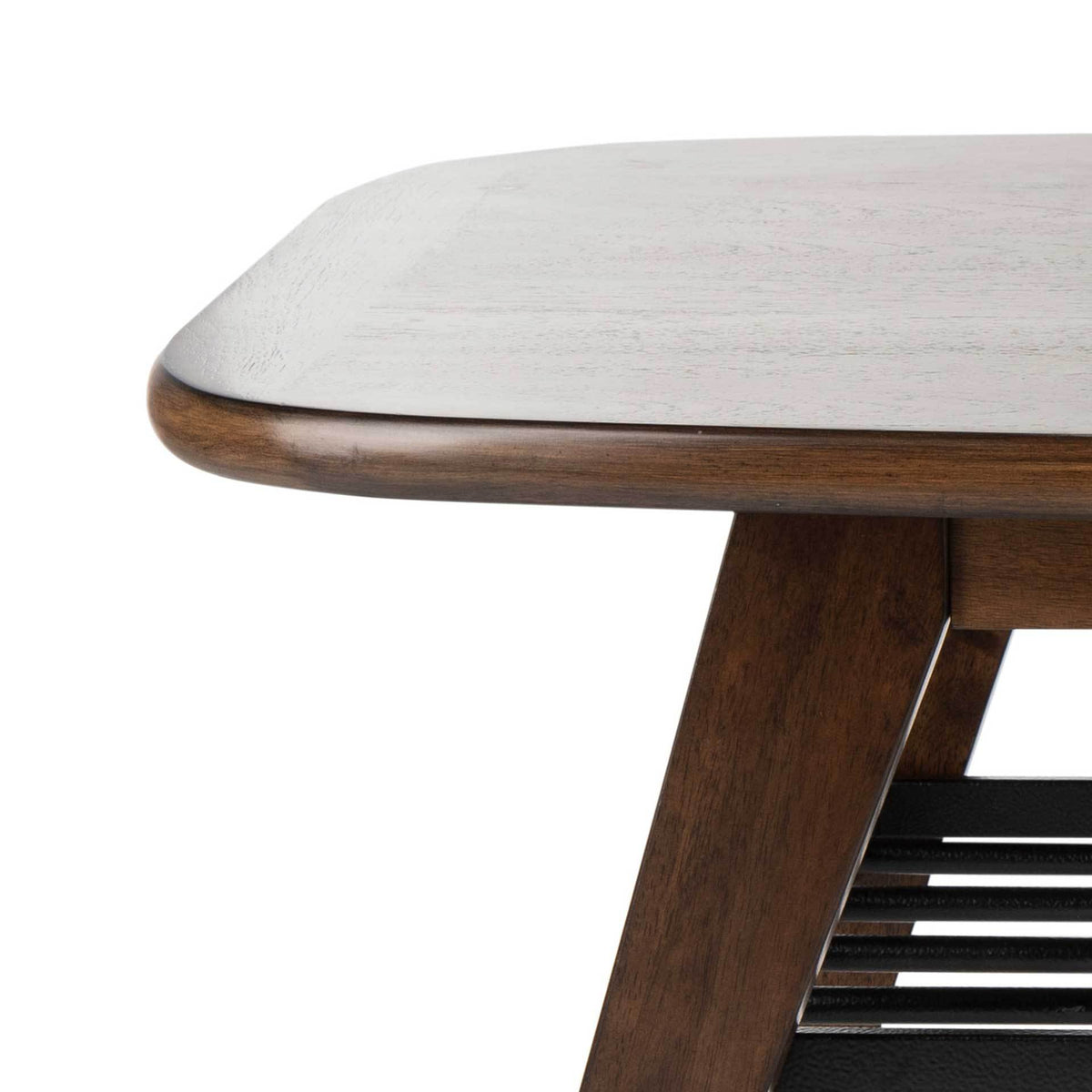 A smooth, rounded walnut-finish edge adds warmth above the angled support and metal shelf.