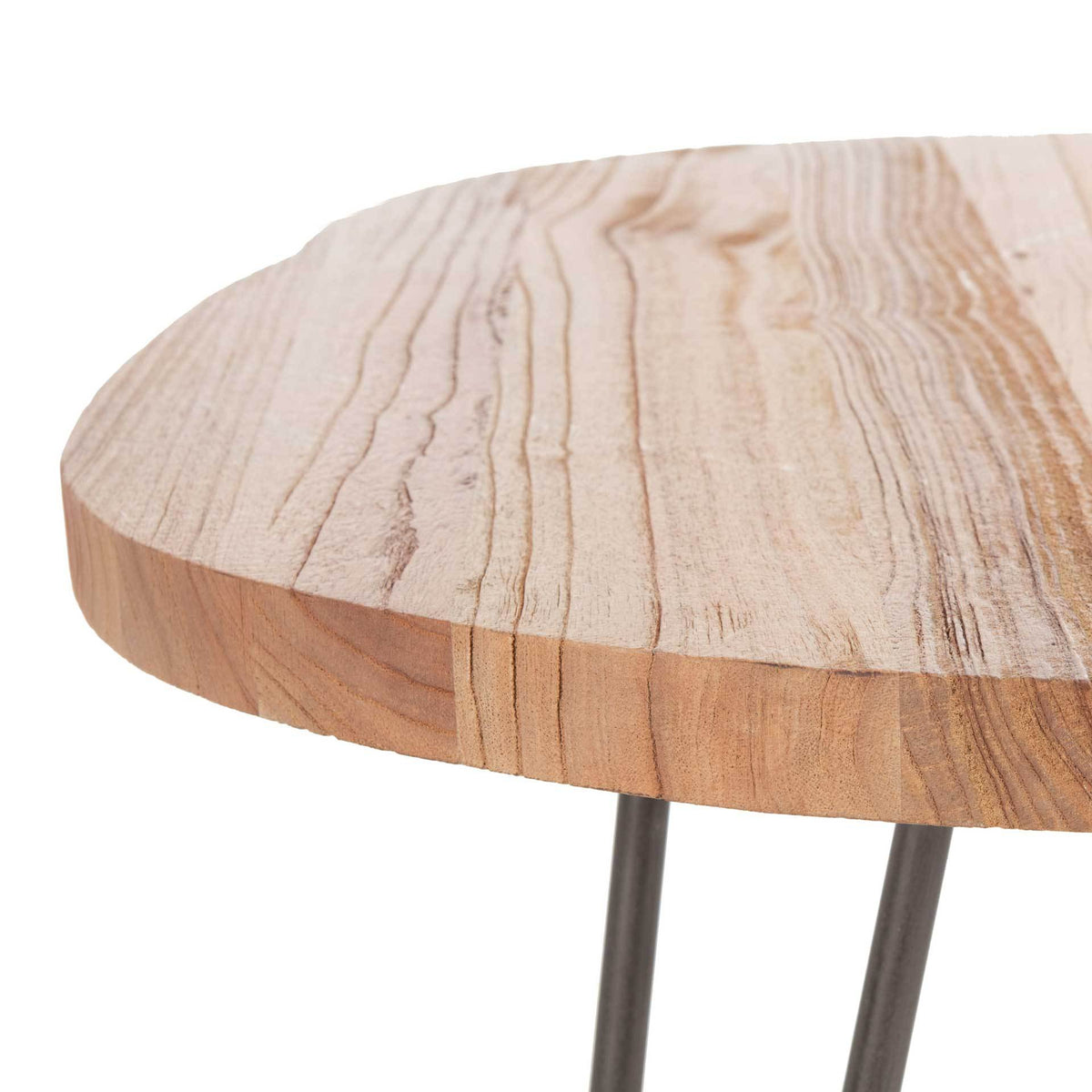 The thick tabletop highlights sweeping wood grain and a softly irregular edge