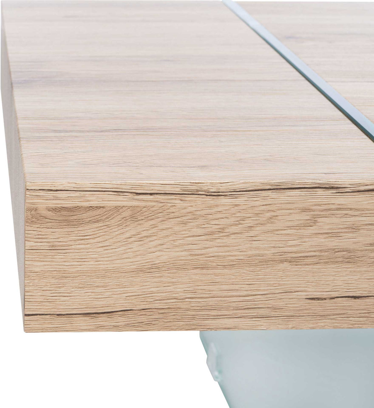 The thick wood-grain tabletop shows layered texture where its surface meets a glass panel.