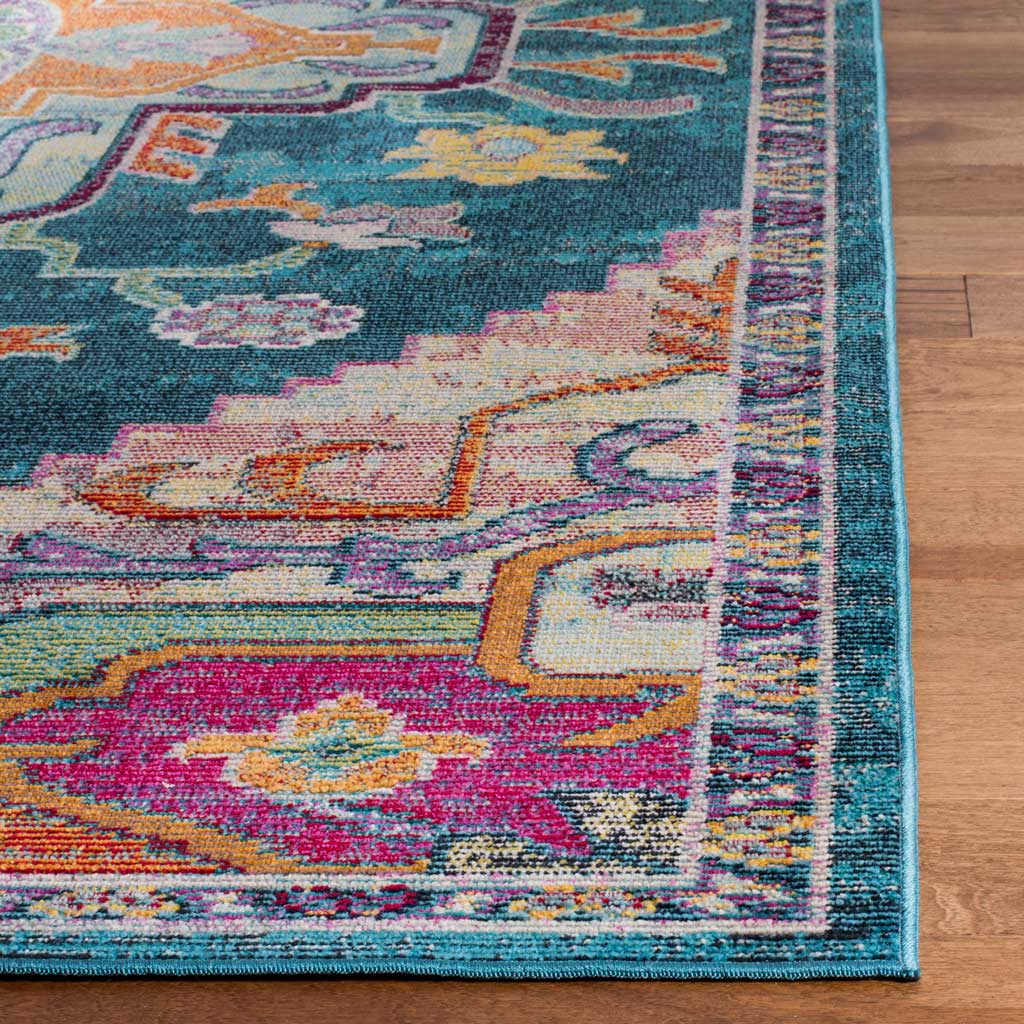 A bound teal edge frames richly colored rose, orange, and yellow floral motifs