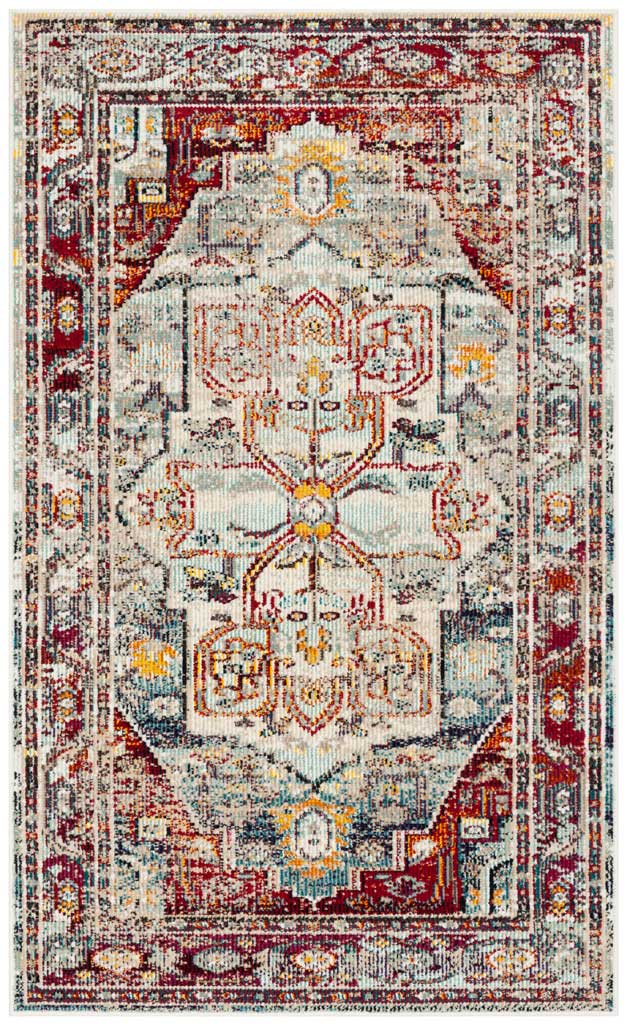 A compact rug pairs a pale blue medallion with bold red corners and a distressed floral border
