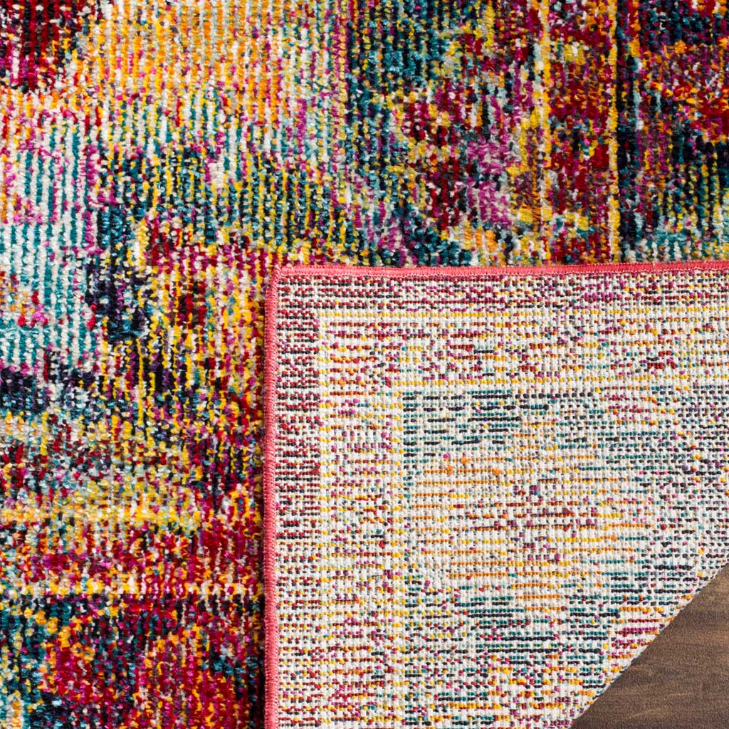 Woven cotton backing and finished ruby edging complement a colorful floral rug