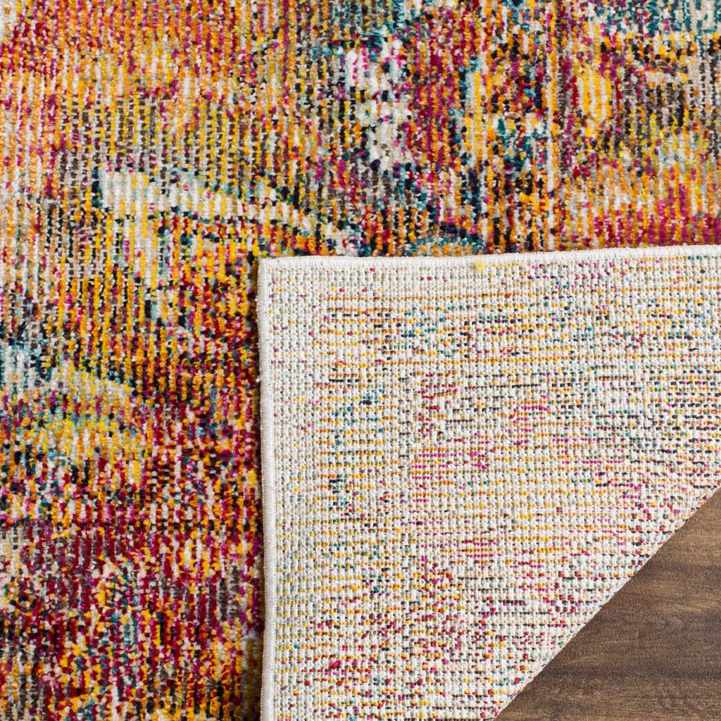 Woven cotton backing and bound edging finish a richly colored, low-profile floral rug