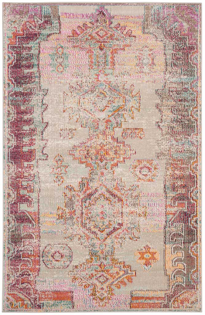 Soft gray meets pink and orange medallions in a rug finished with a patterned purple border.