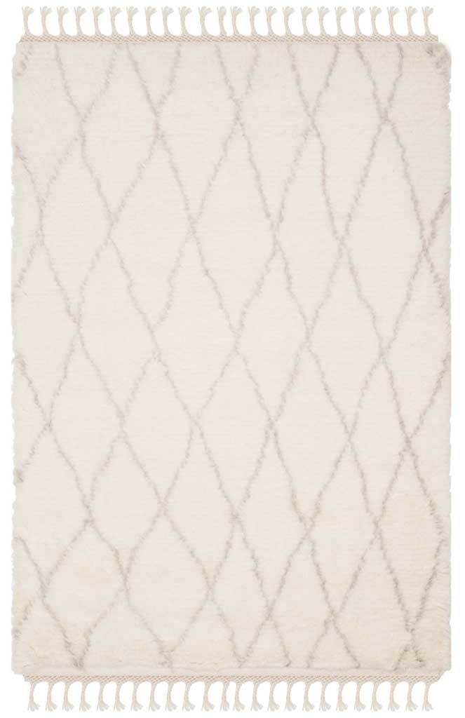 Plush ivory shag is traced with softly wavering gray diamonds and fringe