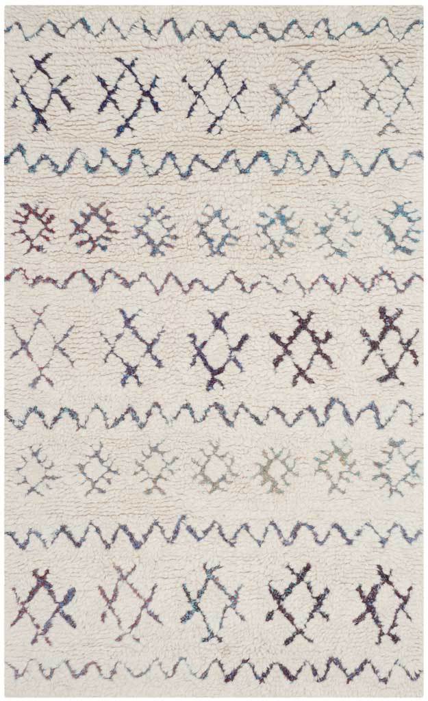 A compact ivory rug brings blue, burgundy, and gray motifs to repeating wavy stripes.