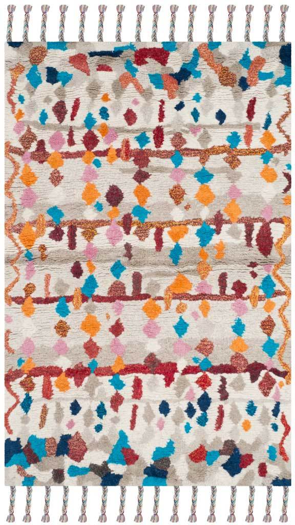 Hand-tufted ivory rug with colorful geometric motifs and fringed ends.