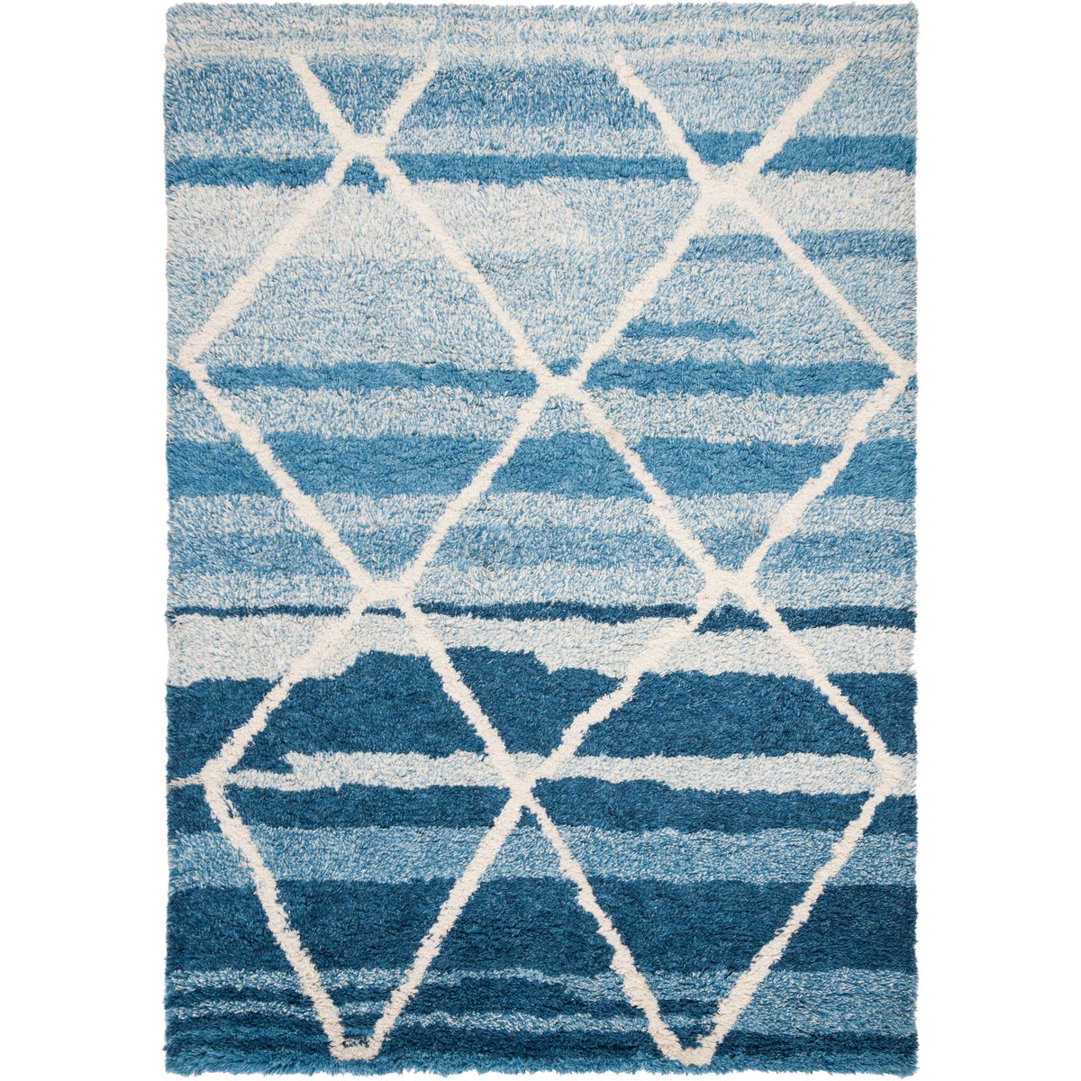 Oversized ivory diamonds stand out against a blue rug with shifting tonal bands.