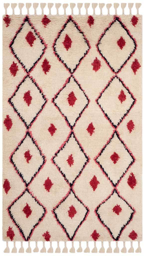 An ivory 5' x 8' rug with a bold diamond lattice, vivid fuchsia motifs and fringed ends