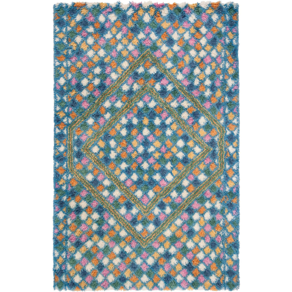 Blue and ivory rug pairs a central diamond with a dense mosaic of colorful tufts