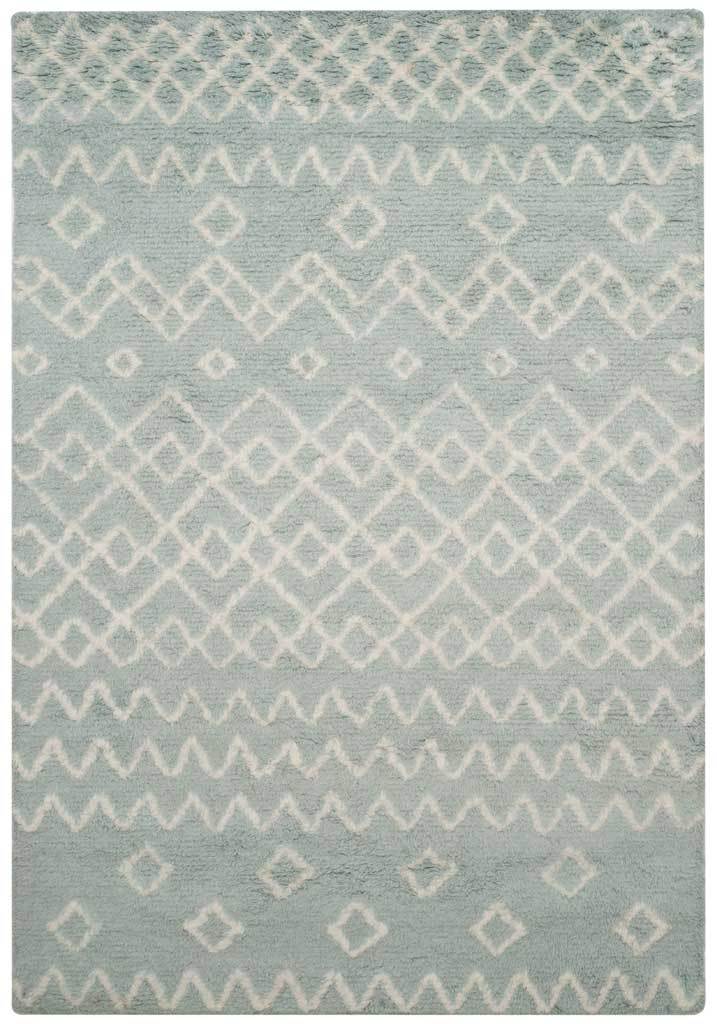 Soft blue area rug features interwoven ivory diamonds and wavy lines
