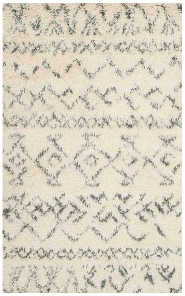 Compact ivory shag rug with softly drawn gray diamonds and zigzag stripes