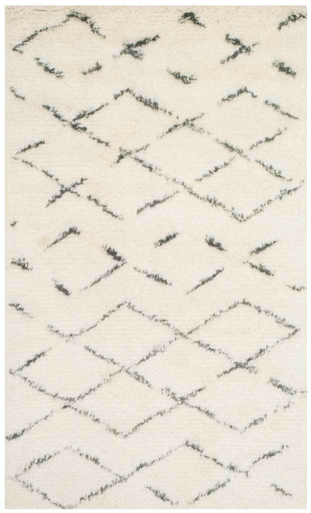 Small ivory shag rug with gray lines tracing oversized, imperfect diamonds