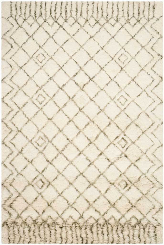 Muted green lattice and small inset diamonds cross a soft ivory shag field