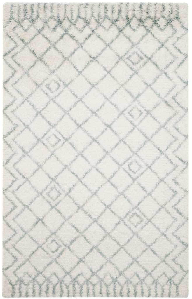 Ivory shag rug pairs a delicate blue lattice with patterned short ends