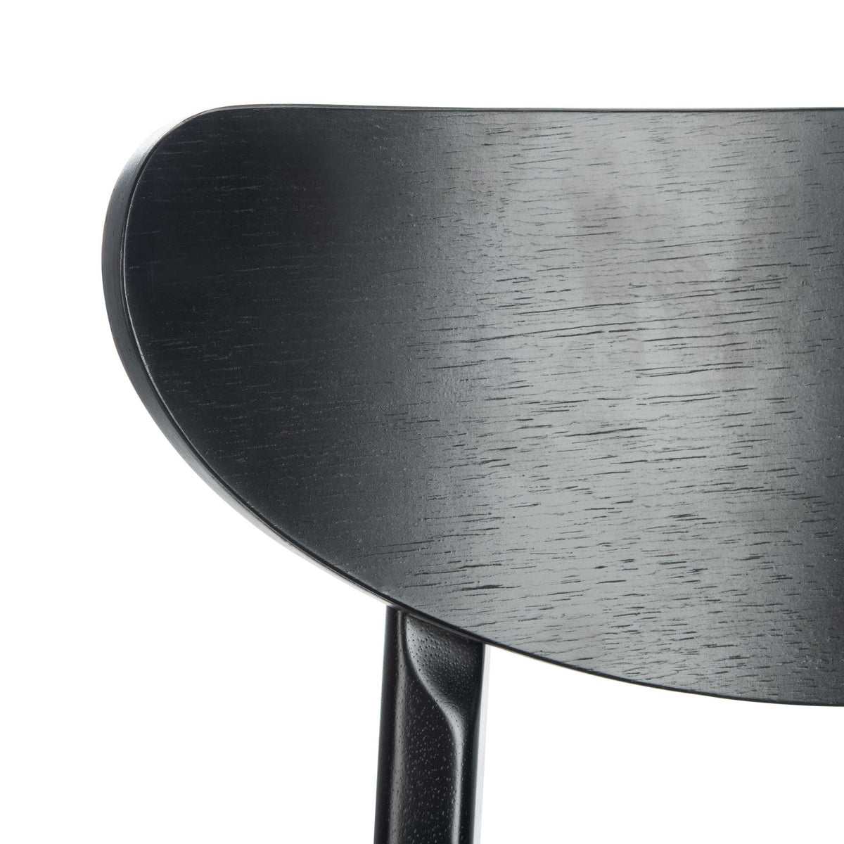 Curved black wooden backrest reveals fine grain beneath a smooth finish