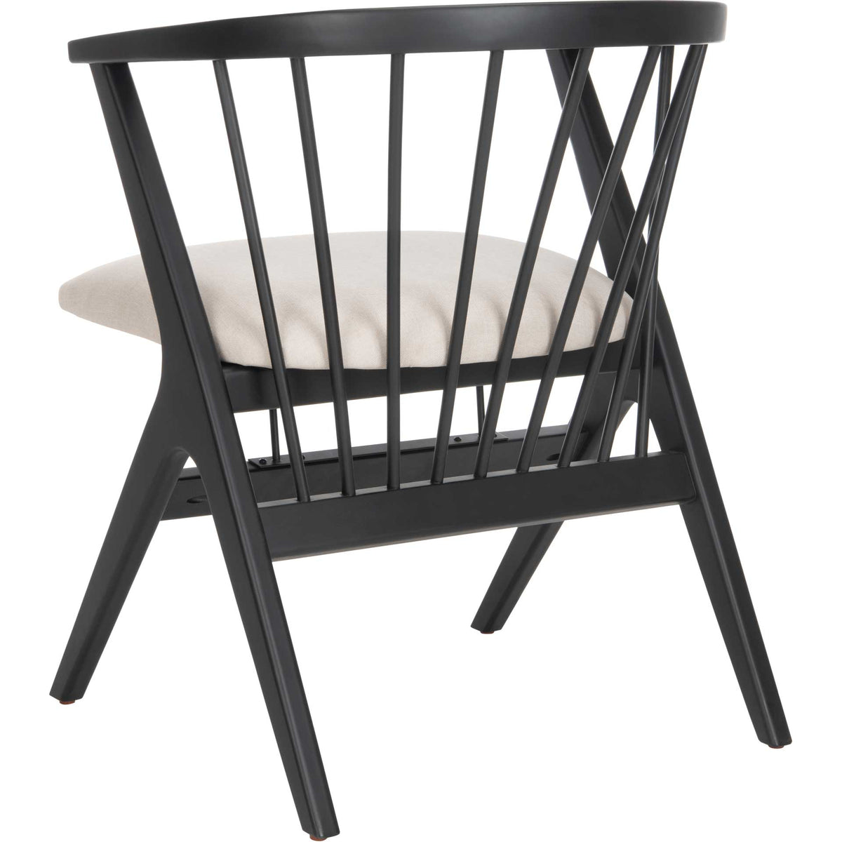 A curved spindle back contrasts with sharply angled legs and a light beige padded seat.