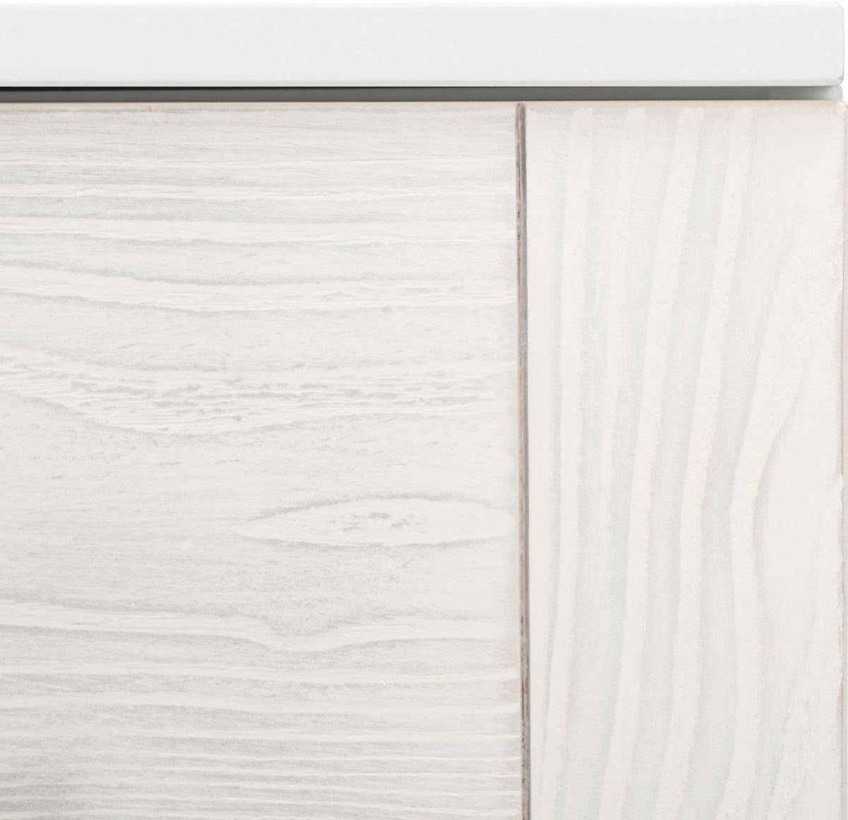 Whitewashed grain and a bright white frame bring gentle texture to the dresser's clean-lined design.