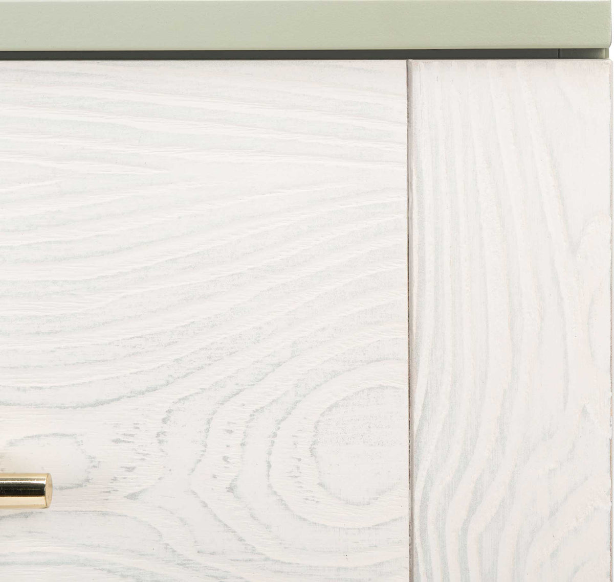 Subtle wood grain on the whitewashed drawer front contrasts with the pale gray frame.