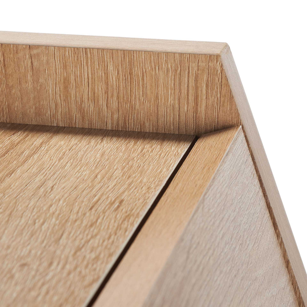 Warm woodgrain melamine wraps the upper ledge and neatly joined angled side panels.