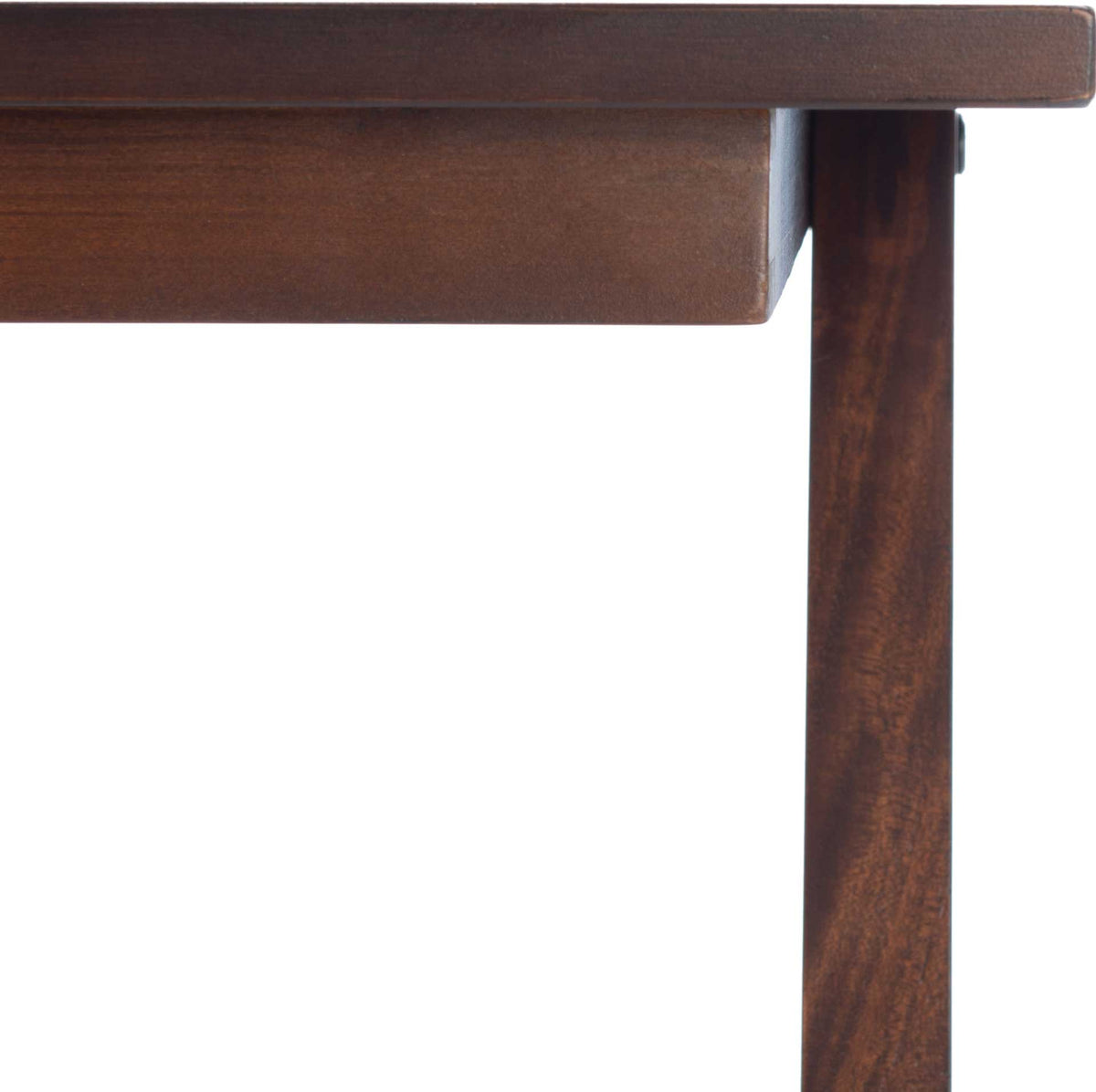 Rich walnut wood grain adds warmth to the tabletop edge, apron, and upright leg.