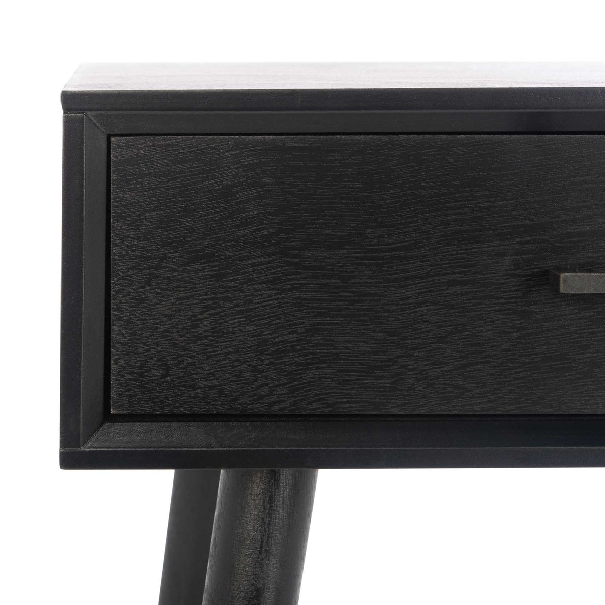 Subtle wood grain enriches the framed front of this black writing desk's drawer