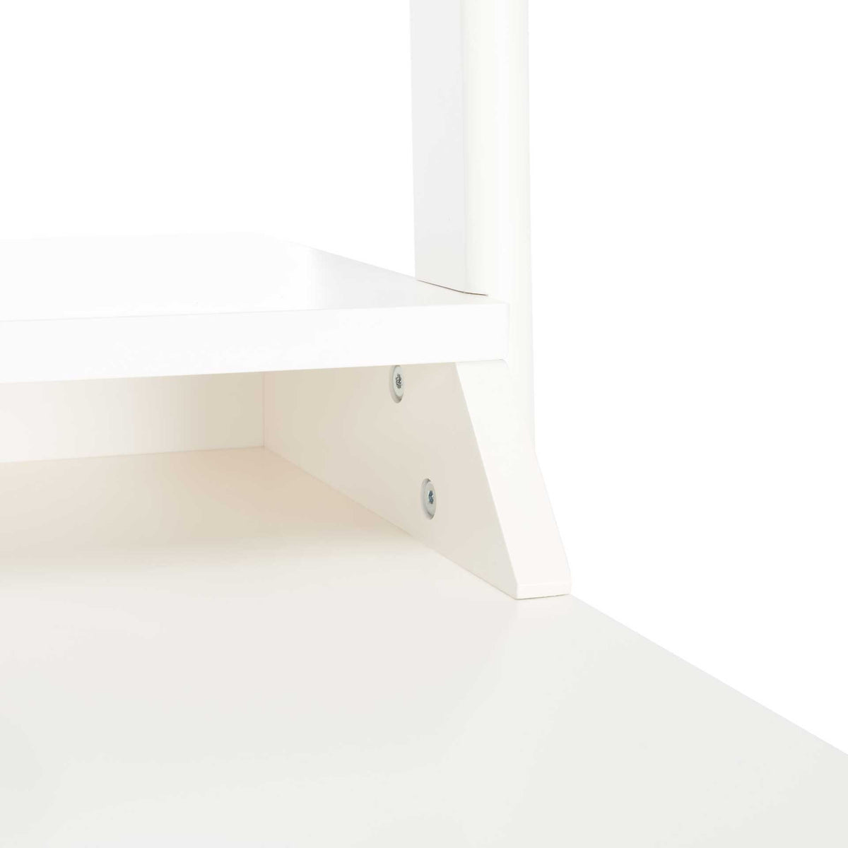 An angled white brace and metal fasteners reinforce the raised shelf.