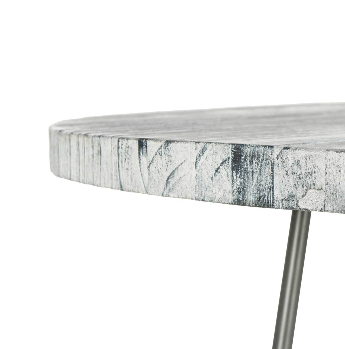 Thick tabletop edge reveals dark wood grain beneath a distressed whitewash