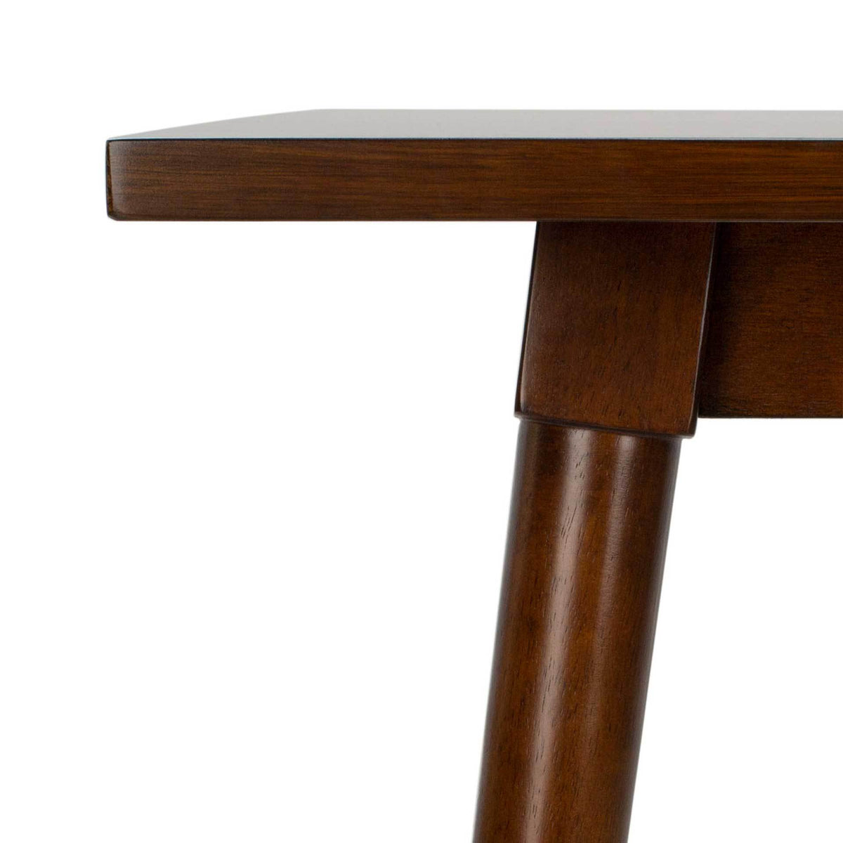 A slim walnut-finished tabletop meets an angled leg beneath a clean-lined apron.