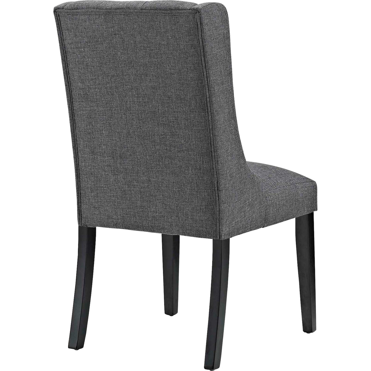 Gray dining chair has a smooth fabric-covered back and gently curved profile above dark wood legs