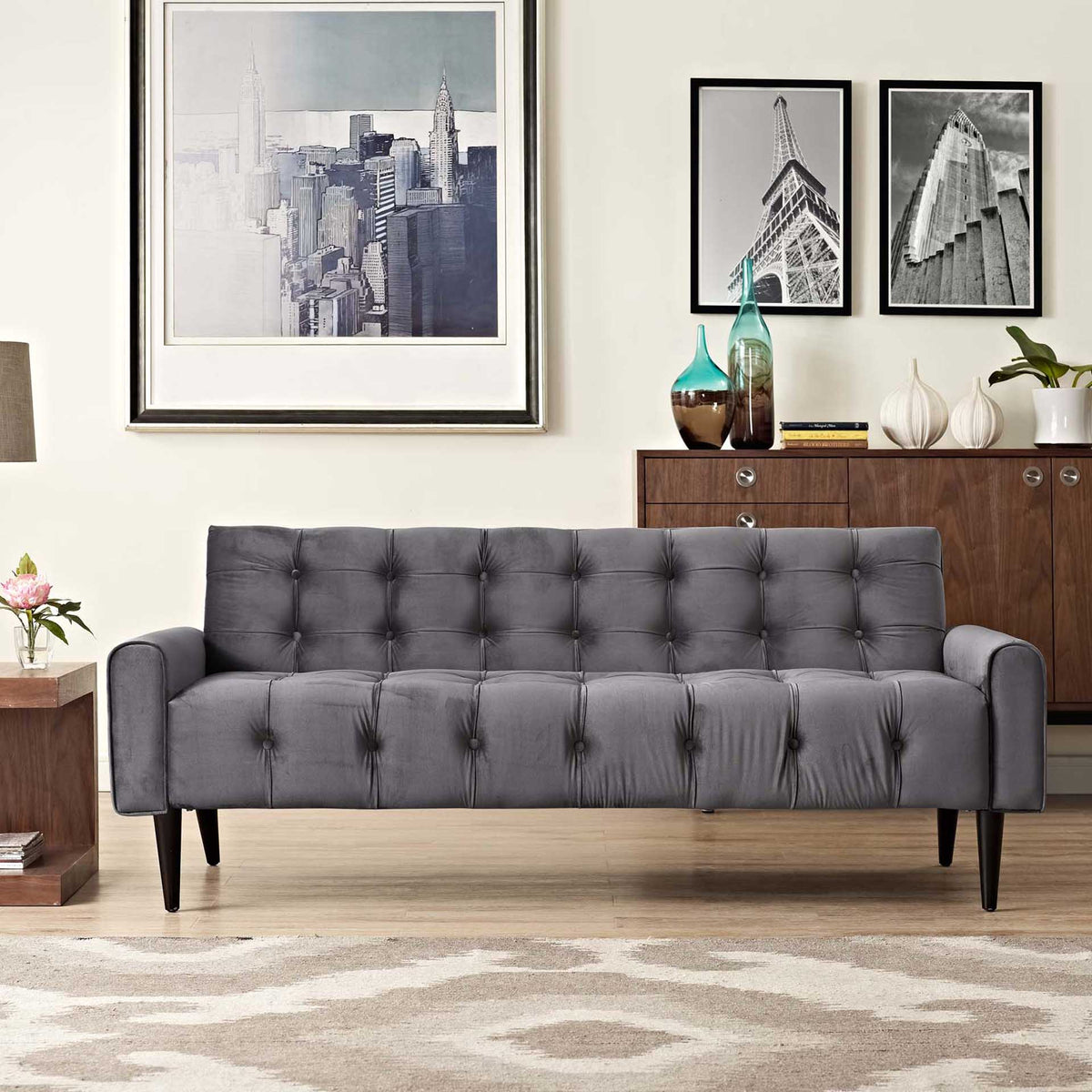 Gray button-tufted velvet sofa brings plush seating and modern style to the living room