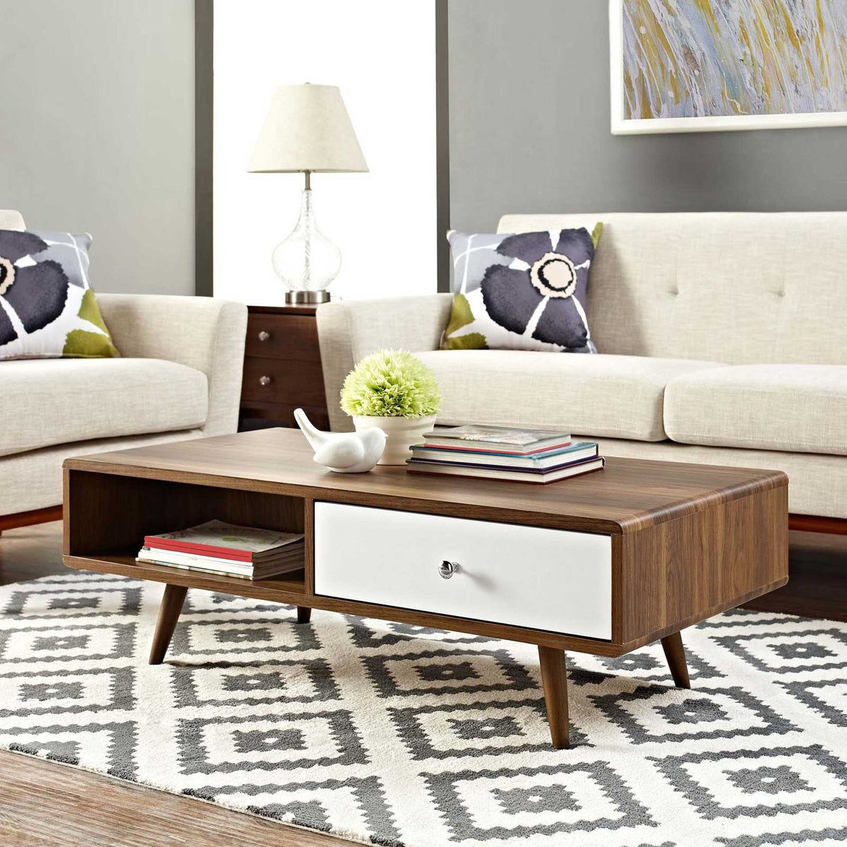 Walnut-grain coffee table with a white drawer and open shelf complements a modern living room