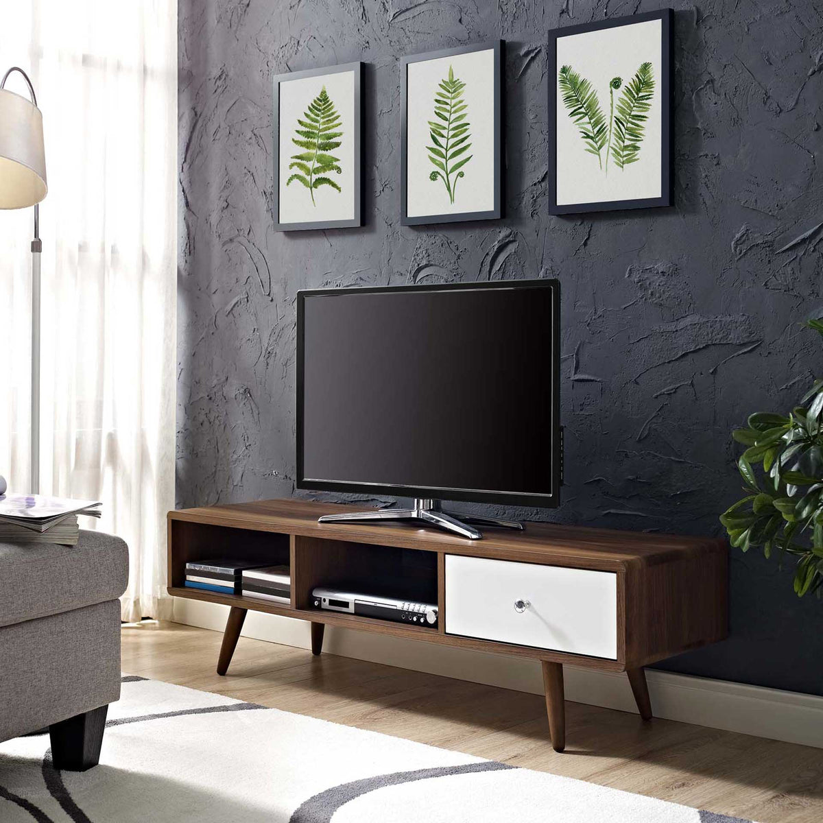TV stand styled in a cozy living room, organizing consoles and decor beneath your screen