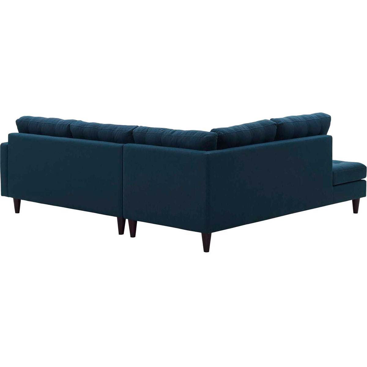 Smooth blue upholstery wraps the outside of the sectional's L-shaped frame above tapered legs