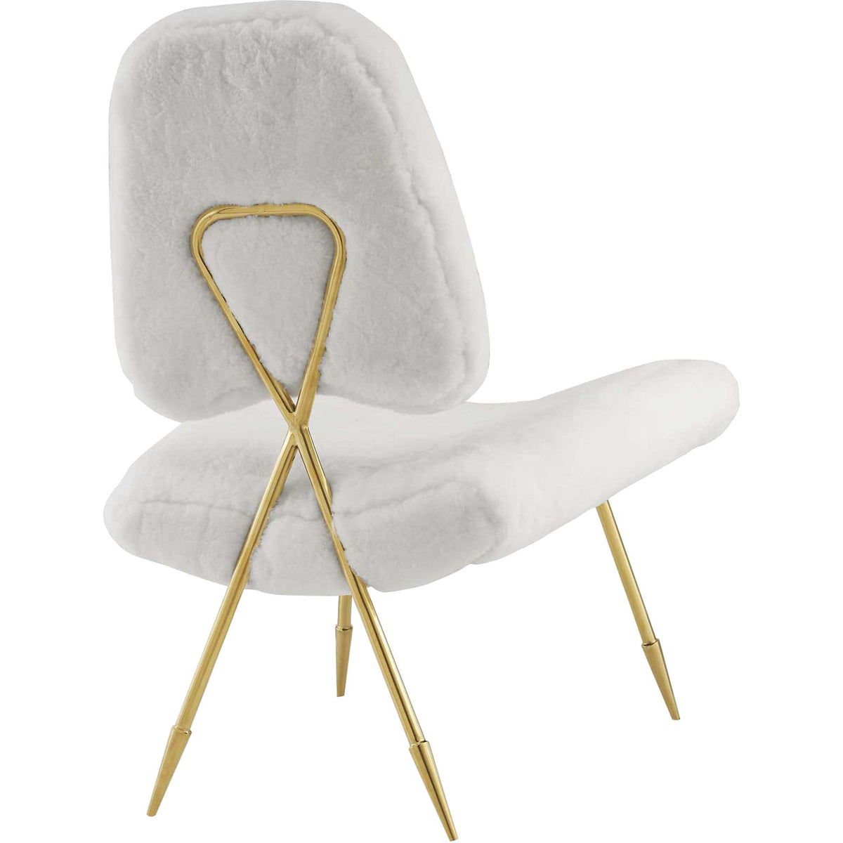The soft white sheepskin back pairs with a crossed gold support and splayed legs.