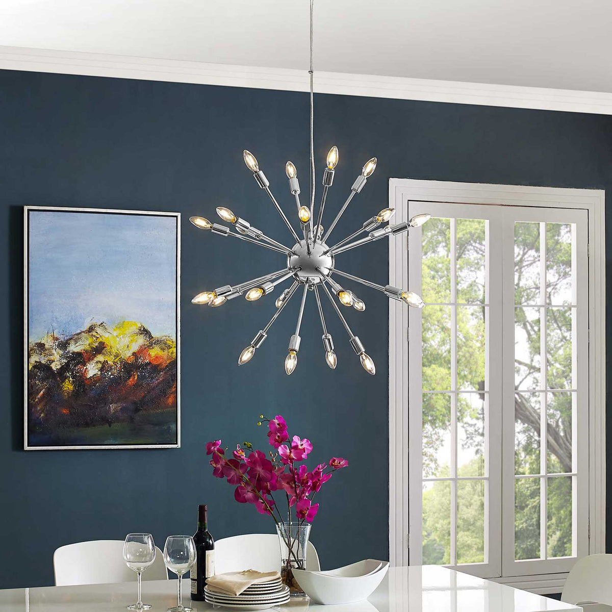 Warm glowing bulbs bring a radiant silver starburst to a contemporary dining space