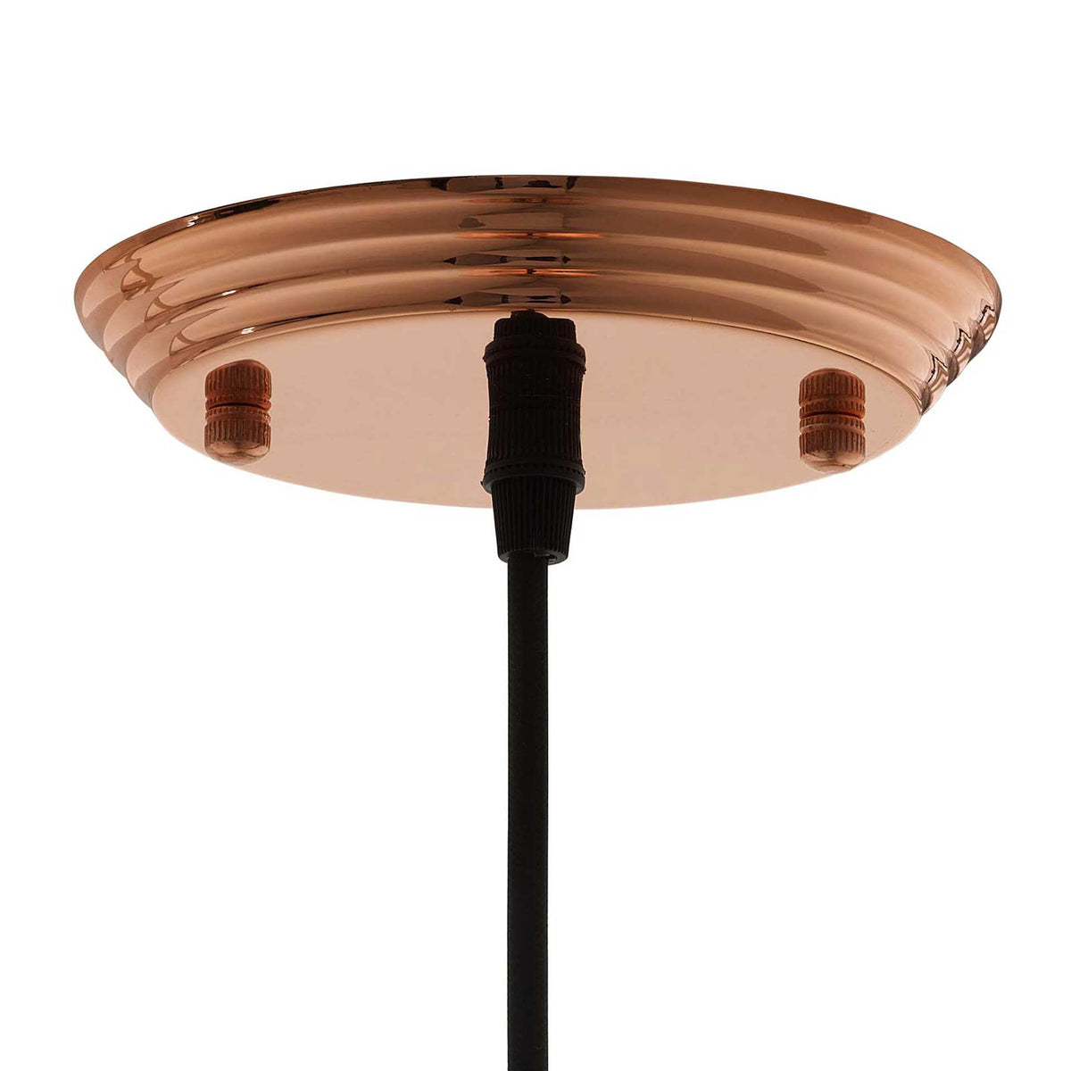 A tiered rose gold ceiling canopy connects to the slim black suspension cord