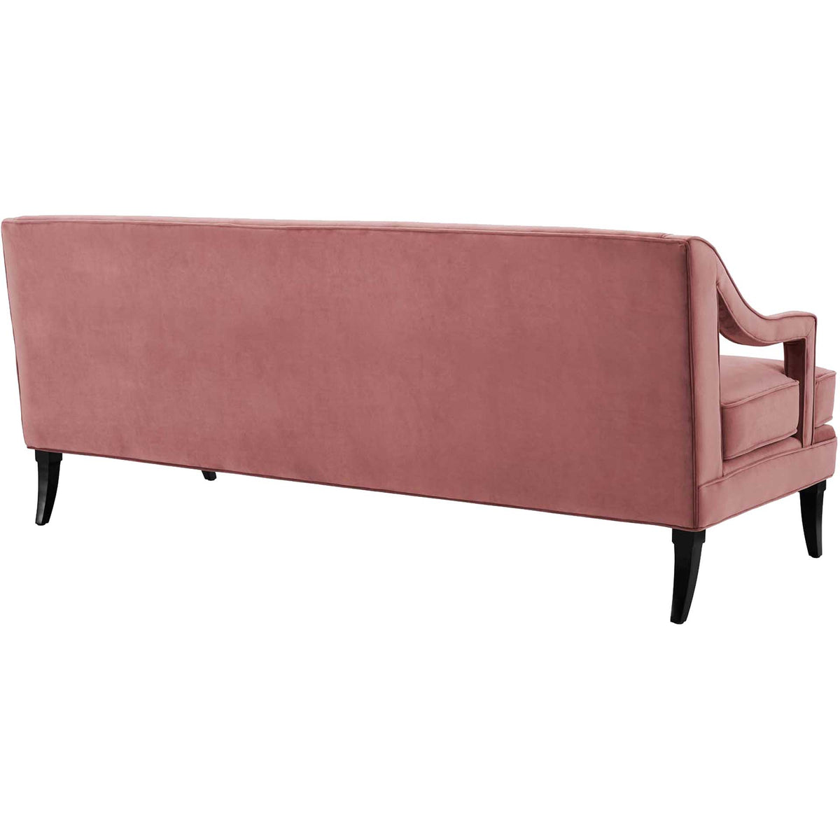 Smooth dusty rose velvet upholstery extends across the sofa back, with open arms and slim dark legs