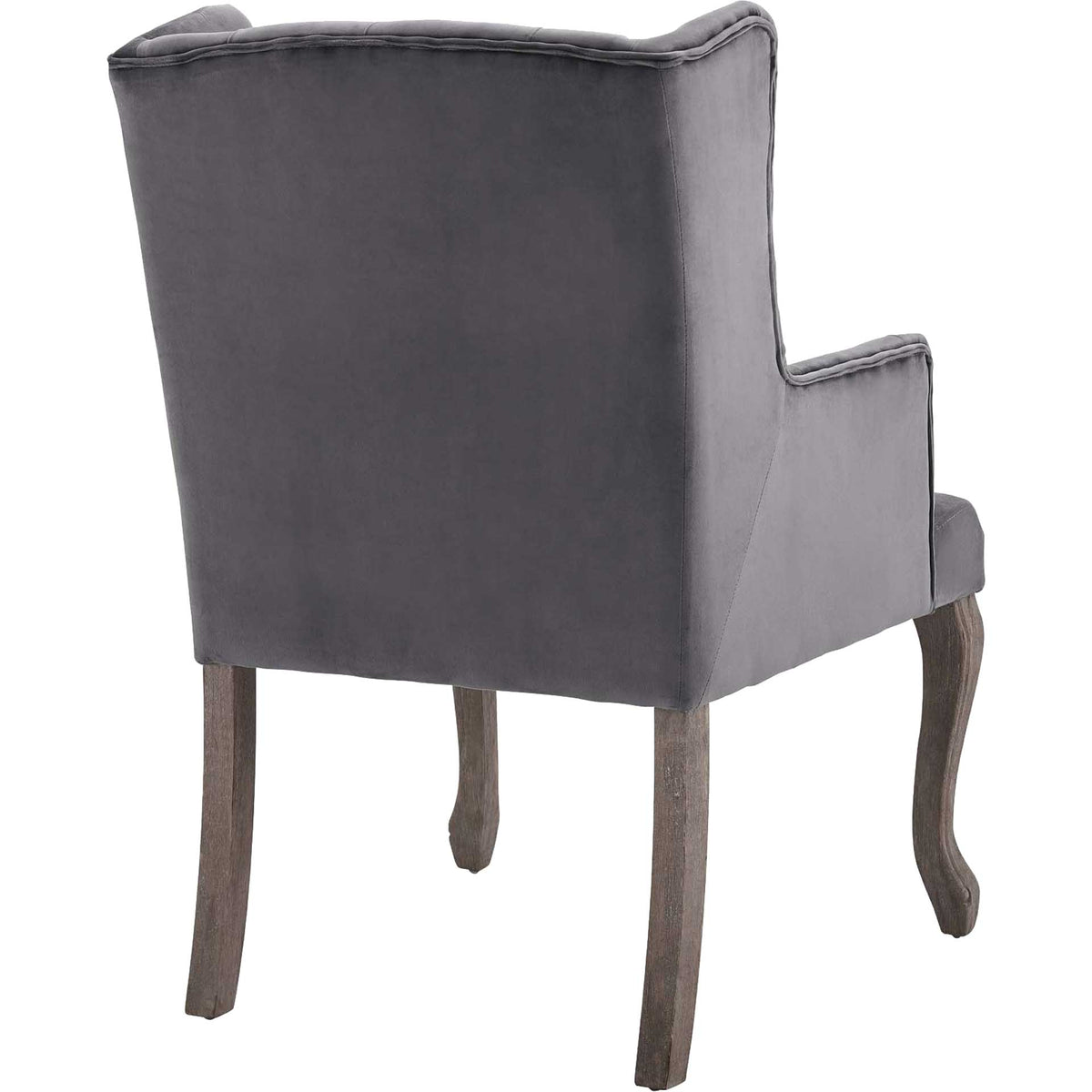 A smooth gray velvet back rises above weathered wood legs with graceful curves
