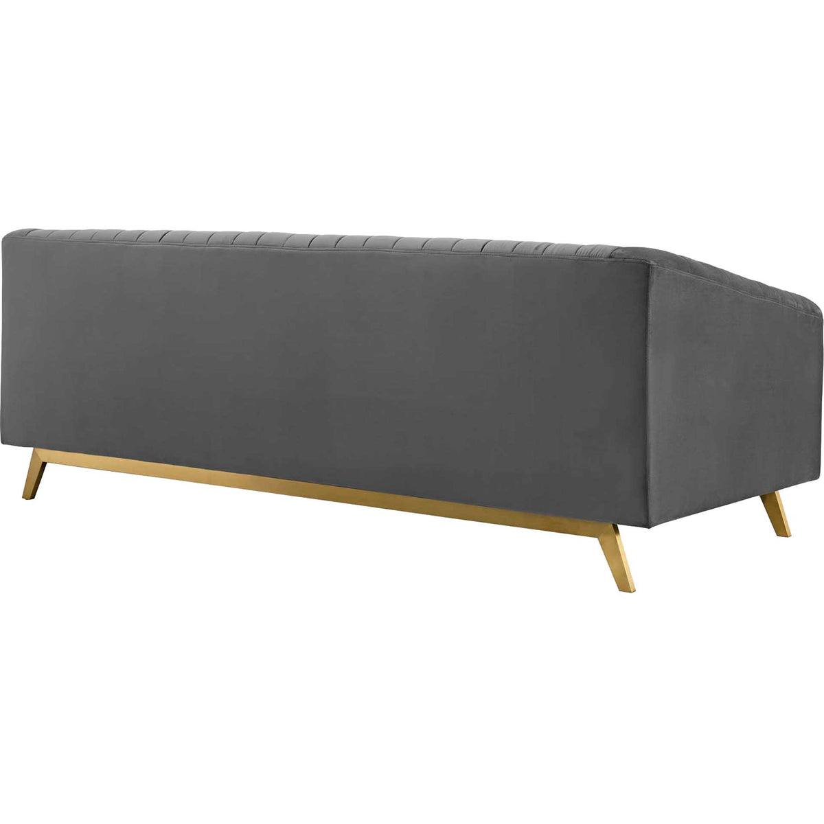 Smooth gray velvet wraps the sofa's back, balanced by splayed gold legs