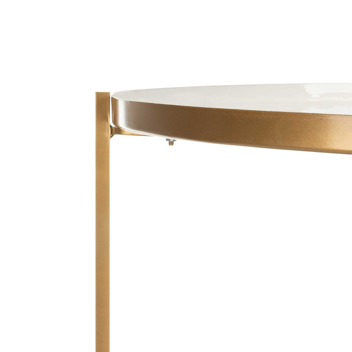 A brass-finished support joins the smooth white shelf and rounded metal rim.