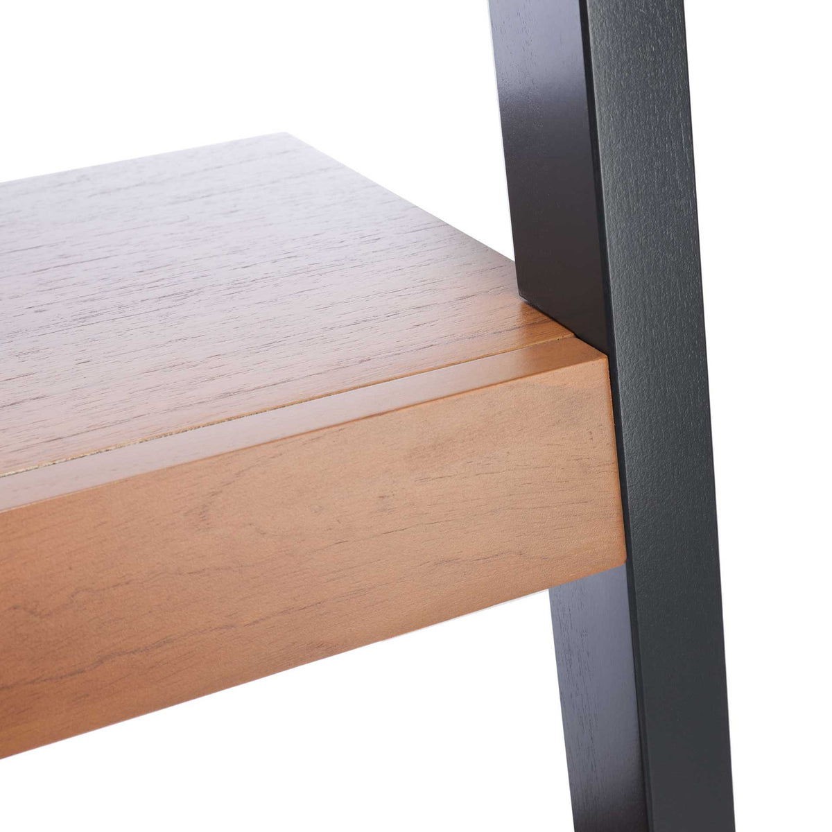 Natural wood grain and a crisp shelf edge contrast with the dark vertical frame.