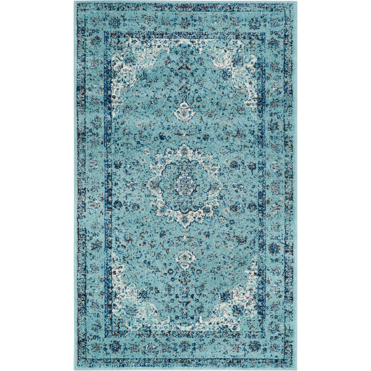 Compact blue rug layers a distressed floral medallion over a cool blue field
